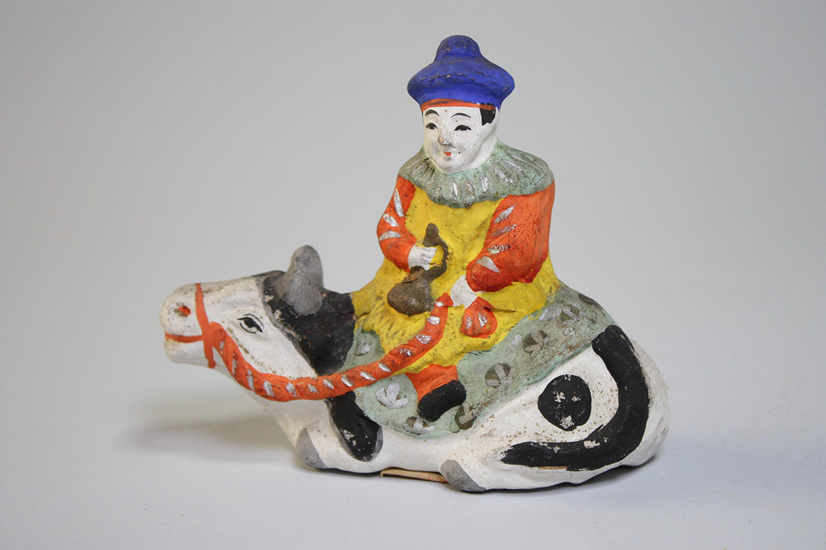 《牛乗り唐人》