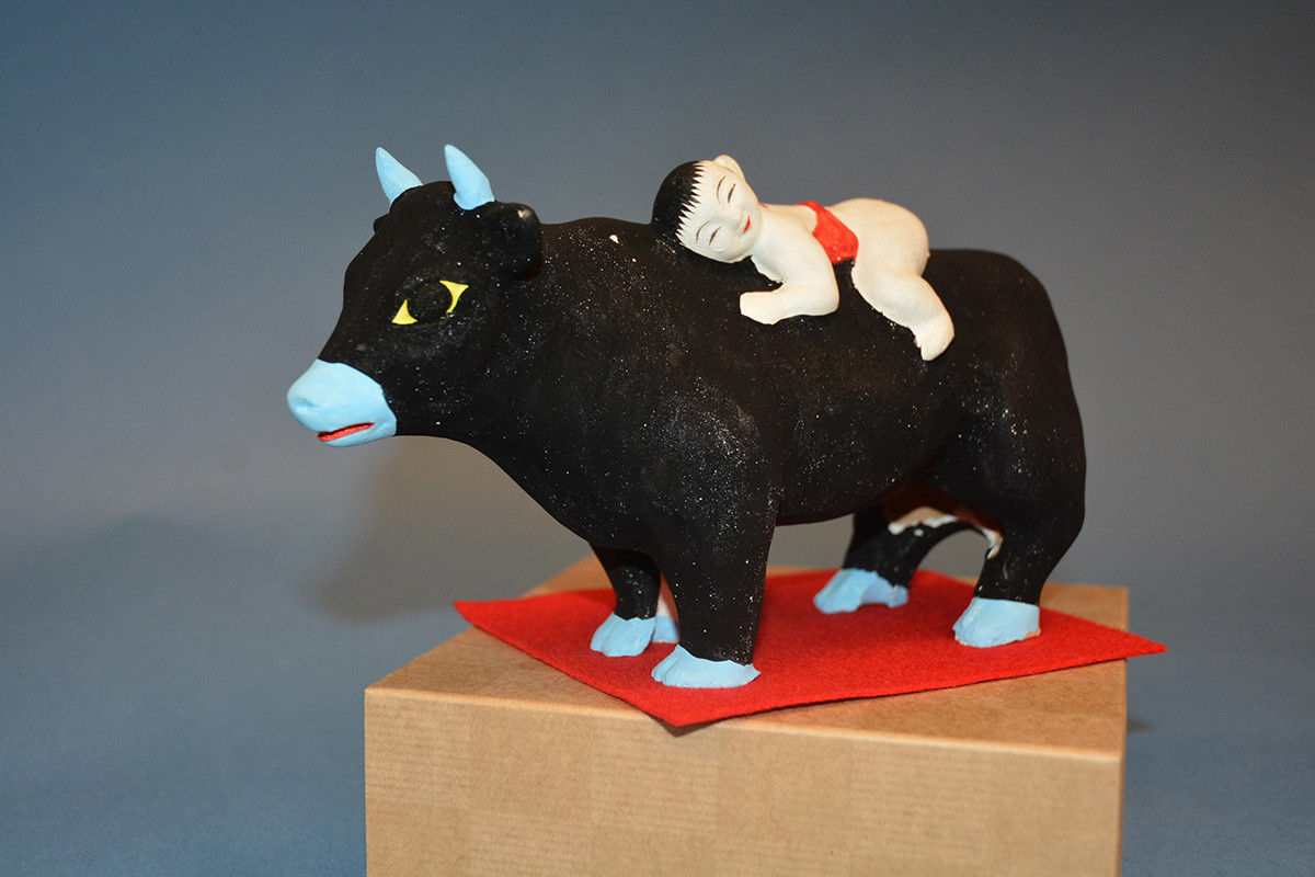 《牛乗り童子》