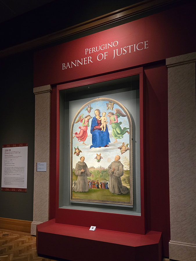 ペルジーノ　《正義の旗ー聖フランチェスコ、シエナの聖ベルナルディーノ、祈る正義兄弟会の会員たちのいる聖母子と天使》1496年ウンブリア国立美術館(ペルージャ)