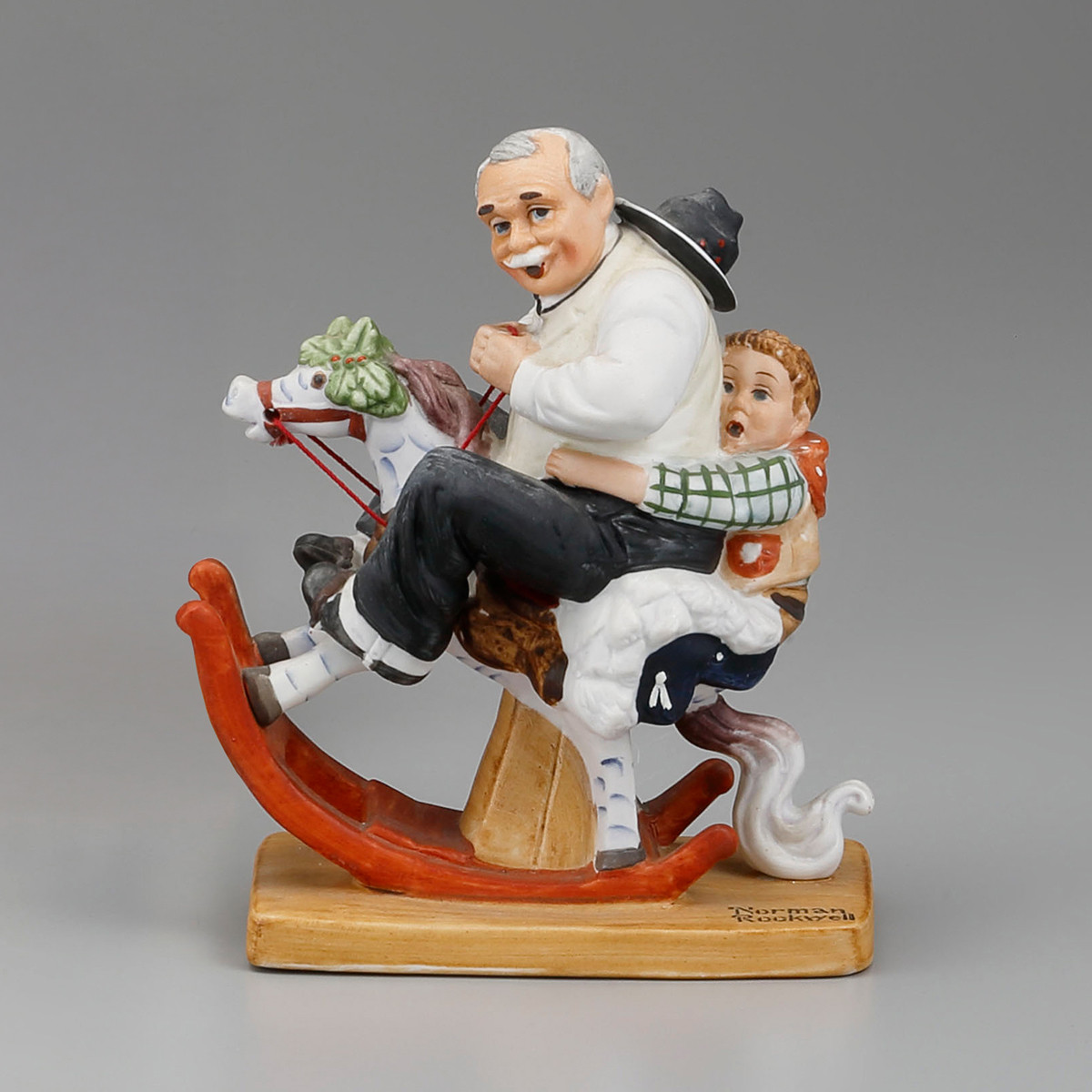 《ノーマン・ロックウェル　木馬に乗る老人と少年》